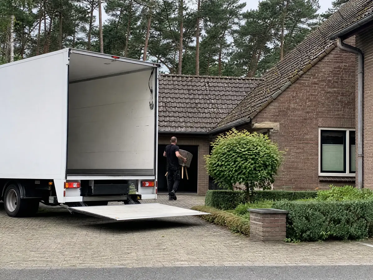 Box truck on the drive of a family home in Turnhout during a house clearance